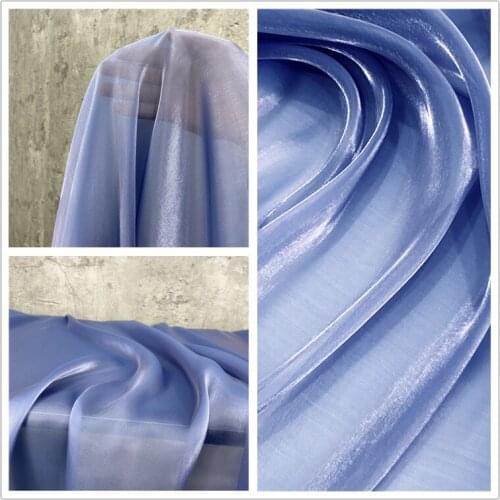 Universe Blue Crystal silk colorful water gauze fabric is delicate and silky, and the colored glaze is bright and glossy
