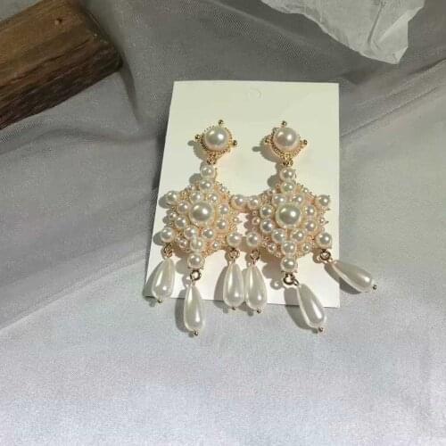 Net red retro pearls exaggerate long earrings female personality Baitao water drops pearl tassels temperament Earrings