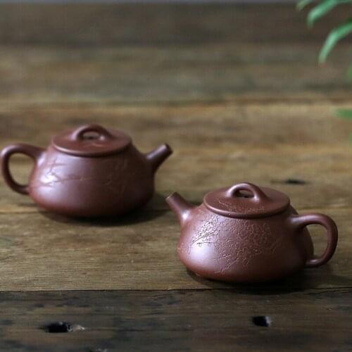 Yishuitang Yixing original handmade purple clay teapot with flat bottom and stone ladle lid 175ml household teapot