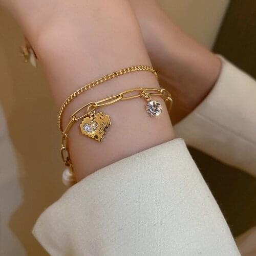 Fresh water pearl seheart double layer bracelet creative advanced sense metal cold wind forest ornaments