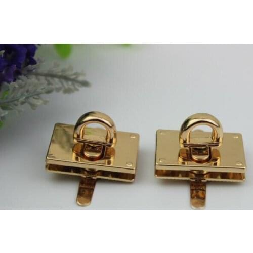 Luggage hardware accessories Golden die-casting twist lock Small twist lock Fang bag lock 100pcs