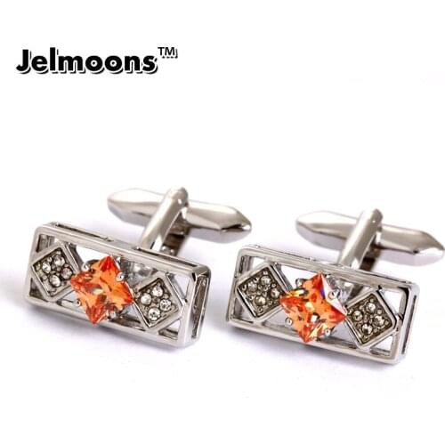 Luxury cufflinks Hollow out rectangle and big orange crystal A symbol of wealth