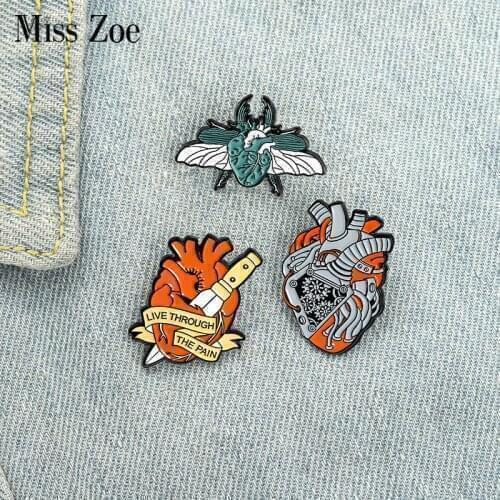 Live Through the Pain Enamel Pins Custom Organ Heart Moth Dagger Brooch Lapel Badge Bag Punk Jewelry Gift for Friends