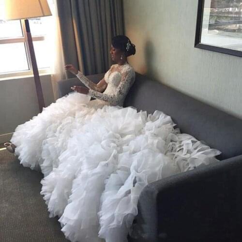 African Long Train Mermaid Wedding Dresses Illusion Lace Full Sleeves Ruffles Tiered Skirt Bride Garden Wedding Dress Chapel