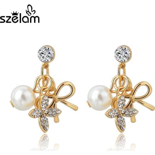 MELIHE Crystal Bowknot Statement Earrings Gold Simulated Pearl Stud Earrings For Women Vintage Bridal Wedding Jewelry SER150050