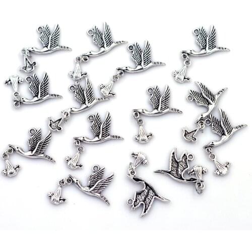 100Pcs Silver Tone Flying Stork Dangling Baby Charm Pendants Fashion Jewelry Findings 17x10mm
