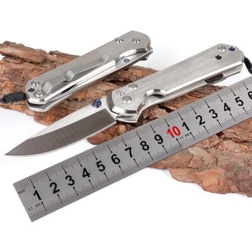 Free shipping Sharp D2 steel blade folding knife Titanium alloy handle hardness 60-62hrc outdoor camping portable Keychain knife