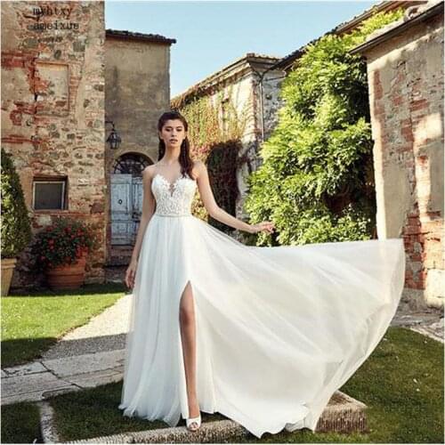 Boho Wedding Dress 2020 Appliqued Sexy See Through Neck Tulle Sexy Backless Beach Bride Dress Sexy Wedding Gown Robe De Mariee