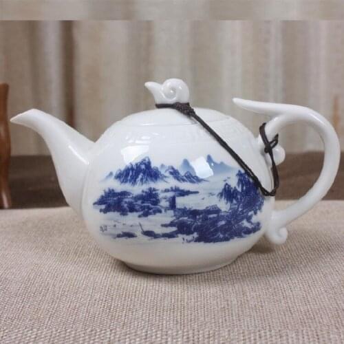 2017 Chinese Kung Fu teapot Creative high white tiles blue and white ceramic teapot, pure hand painted ceramic pot