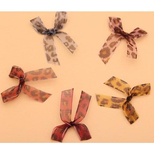 Wholesale new Korean leopard polyester snow yarn manual bow childrens wear pants accessories