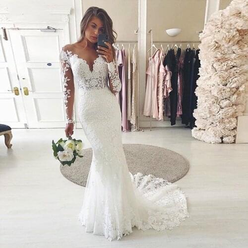 White Lace Wdding Dresses Transparent Long Sleeve Sheer Neck Flower Pattern Appliuques Mermaid Bridal Gown Vestido De Noiva
