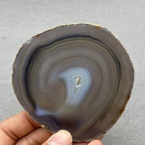 Natural agate slice polished ore specimen with crystal hole