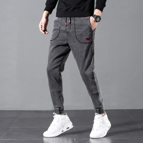 Young Spring New Fashion Casual Stretch Plus Size 6XL 46 Elastic Waist Trousers Denim Pants Male Jeans Men