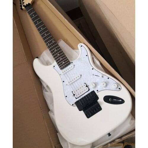 Free shipping custom 6 string white guitar,YNGWIE guitar，ssh pickups,tremolo bridge,pearl shell pickguard,black buttons