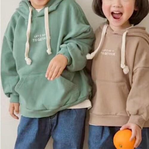 2021 childrens autumn new Korean shoulder walking loose letter pocket hooded Cotton Long Sleeve T-Shirt