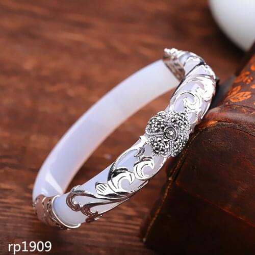 KJJEAXCMY boutique jewelry S925 sterling silver jewelry womens four-leaf clover open white chalcedony bracelet