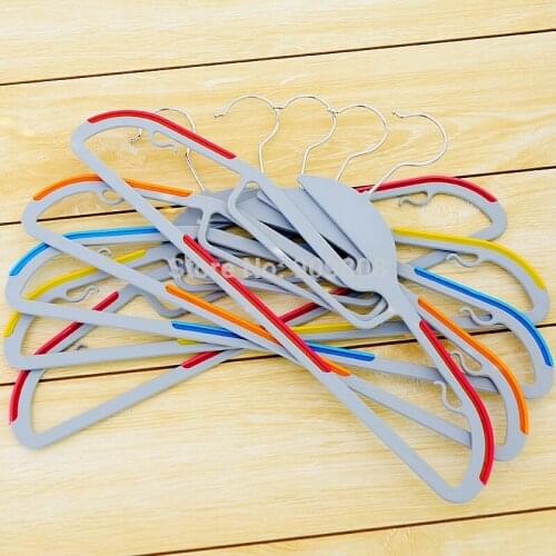 Free shipping 100pcs/lot Flocking Hanger Non-slip useful clothes rack Dry wet dual-purpose clothes hanger