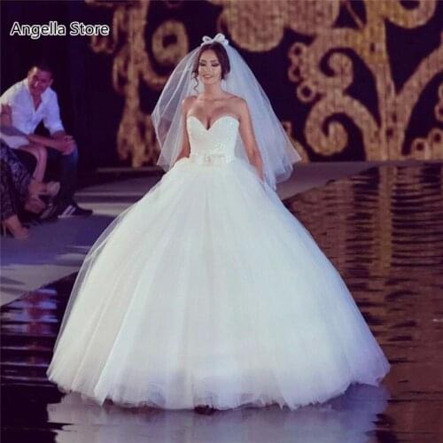 Sparkly Ball Gown Wedding Dress For Bride Sweetheart Strapless Top White Sequined Floor Length Tulle Bridal Formal Wear With Bow