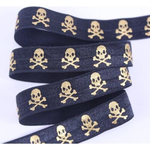 #030 black 5/8" gold foil Skull Cross FOE fold over elastic for Halloween accessaries
