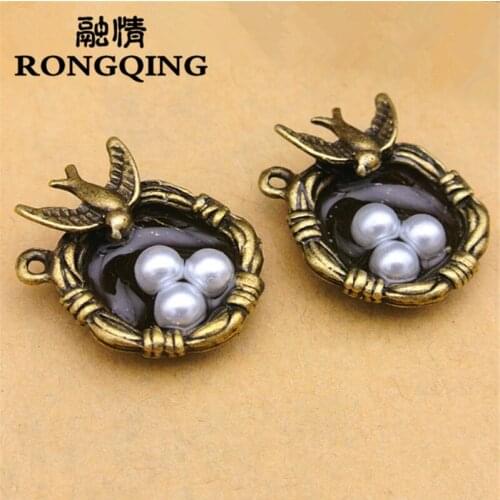 RONGQING 20pcs/Lot 24x20mm Handmade Swallow Charms DIY Antique Silver Charms Bird Eggs Pendant for Crafts