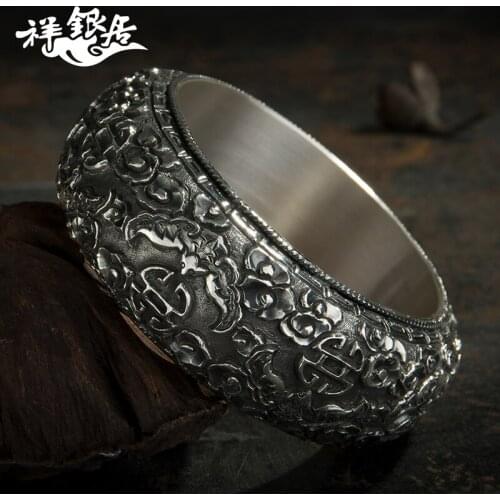 On woodwork in the bat in the immediate relief of 999 fine silver sterling silver bracelet width fine silver bracelet