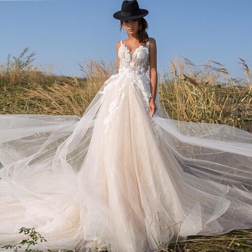 A-Line Lace Appliques Wedding Dresses 2021 V-Neck Sleeveless Sweep Train Bohemian Tulle Bridal Gown Sexy Backless 3D Flowers