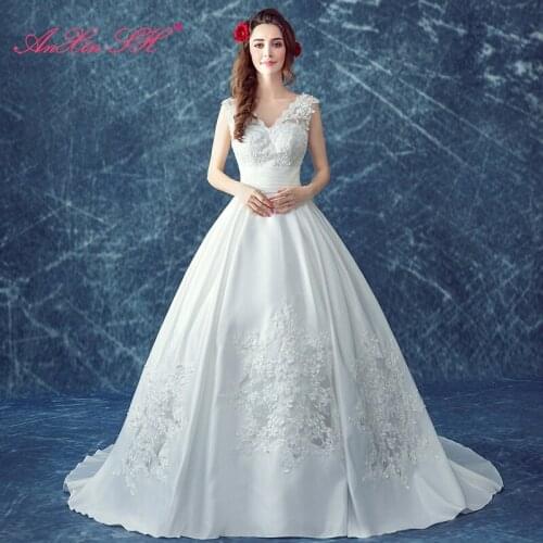 AXJFU The Princess wedding dress Bride sexy slim deep V collar large tail thick satin star lace wedding dress and new 103