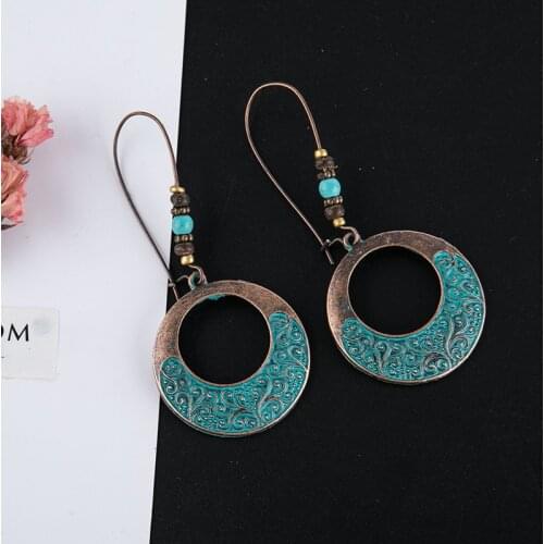 2021 Wholesale Bohemian Style Hollow Round Alloy Carved Pattern Earrings Vintage Fashion Ladies Earrings Wholesale