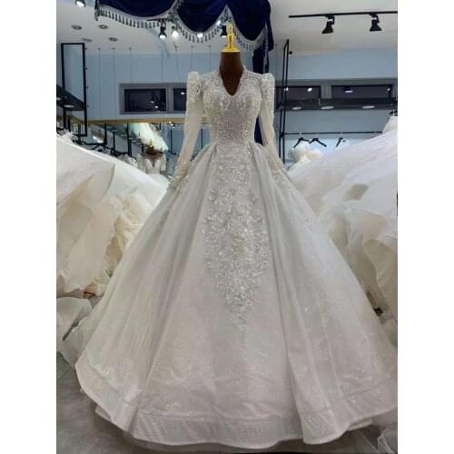 Aoliweiya New Arrival Off the Shoulder Pearls Neckline Ruffles Skirt Sparking Lace Wedding Dress