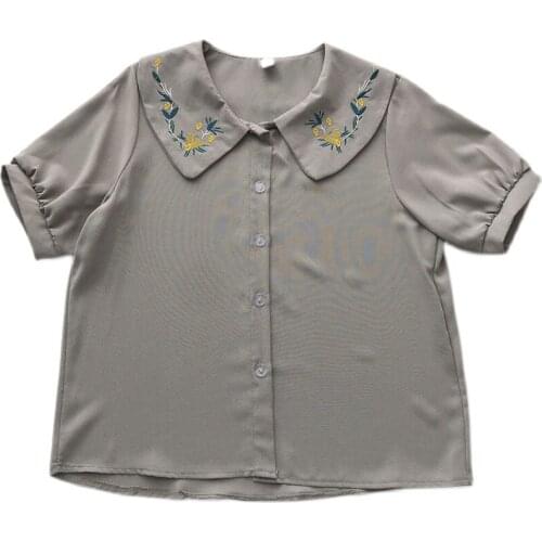 Summer new Korean womens embroidery doll collar wild breasted retro puff sleeve shirt