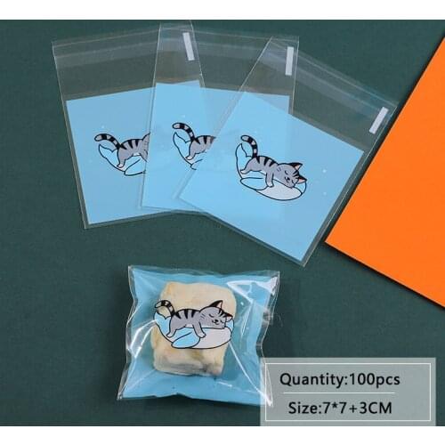 100pcs/lot Cookies Self Adhesive Bag Transparent Blue Bottom Cute Sleeping Cat Homemade Soap Biscuits Birthday Party Gift Bag