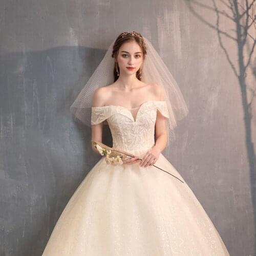 New Light Champagne Wedding Dress Fashion Trends Sexy Boat Neck Beadings cheap ball gown lace up back formal bride dresses