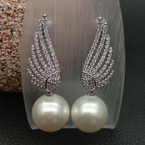 Woman 14mm white shell round pearl micro inlay zircon feather accessories earrings luxury